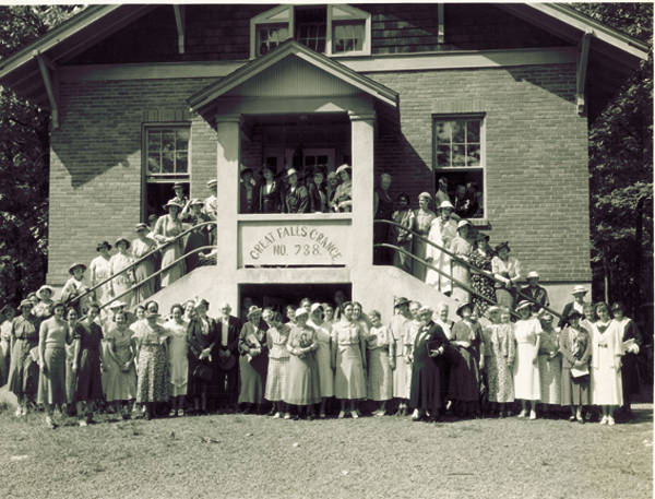 Ladies at the Great Falls Grange awaiting a bus tour in 1936.